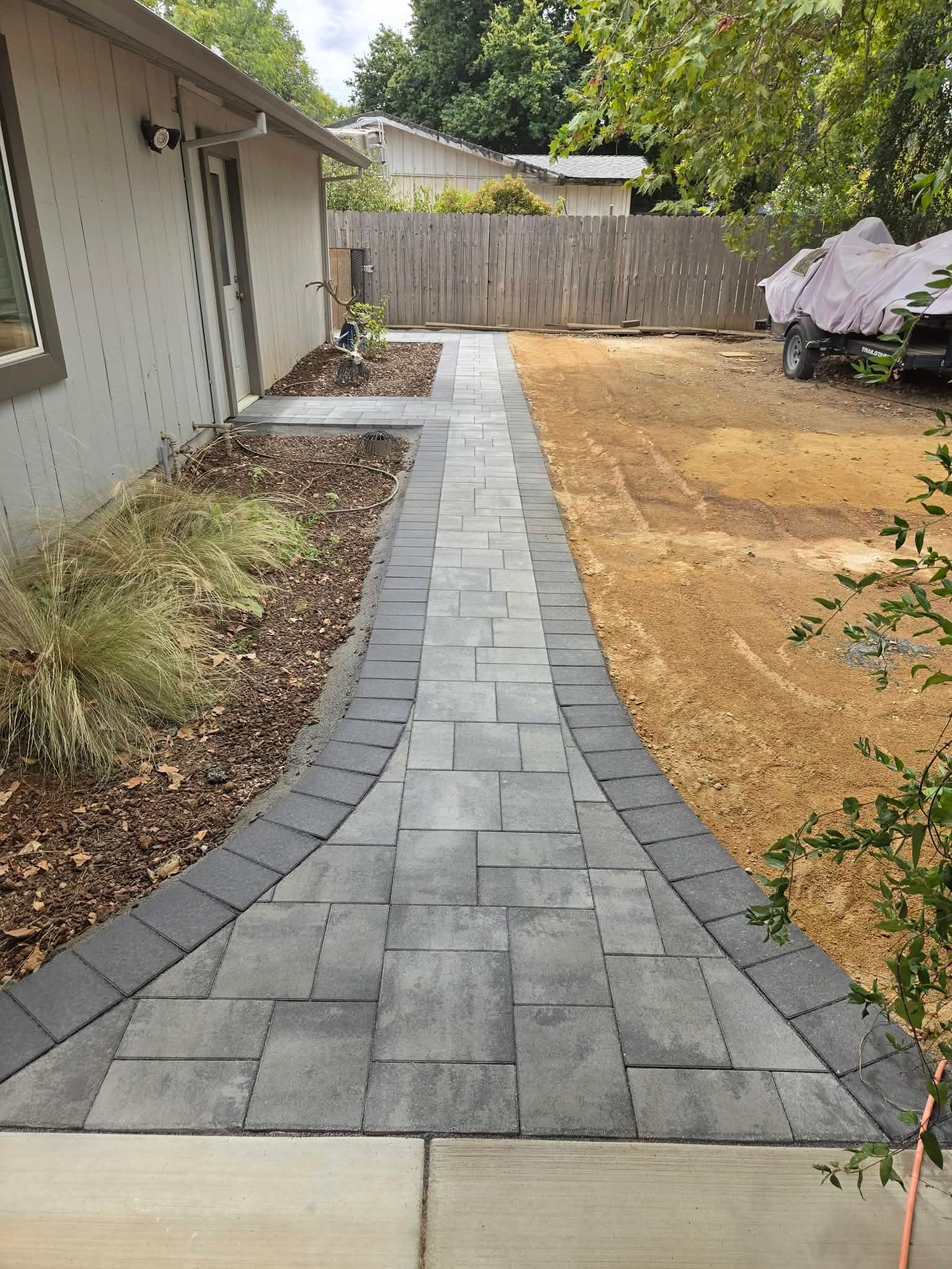 Premier Smooth Torino paver walkway with a contrasting dark border
