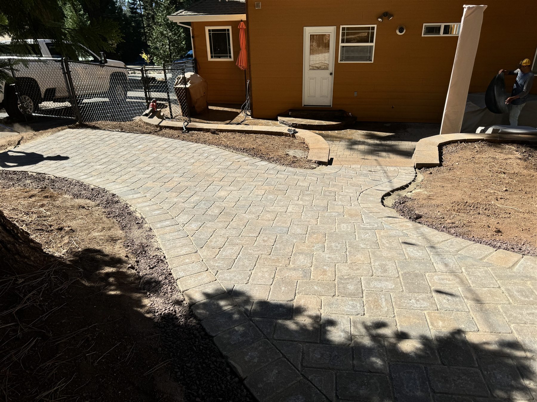 Custom paver patio with curved borders